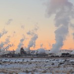 Factories release air pollution.