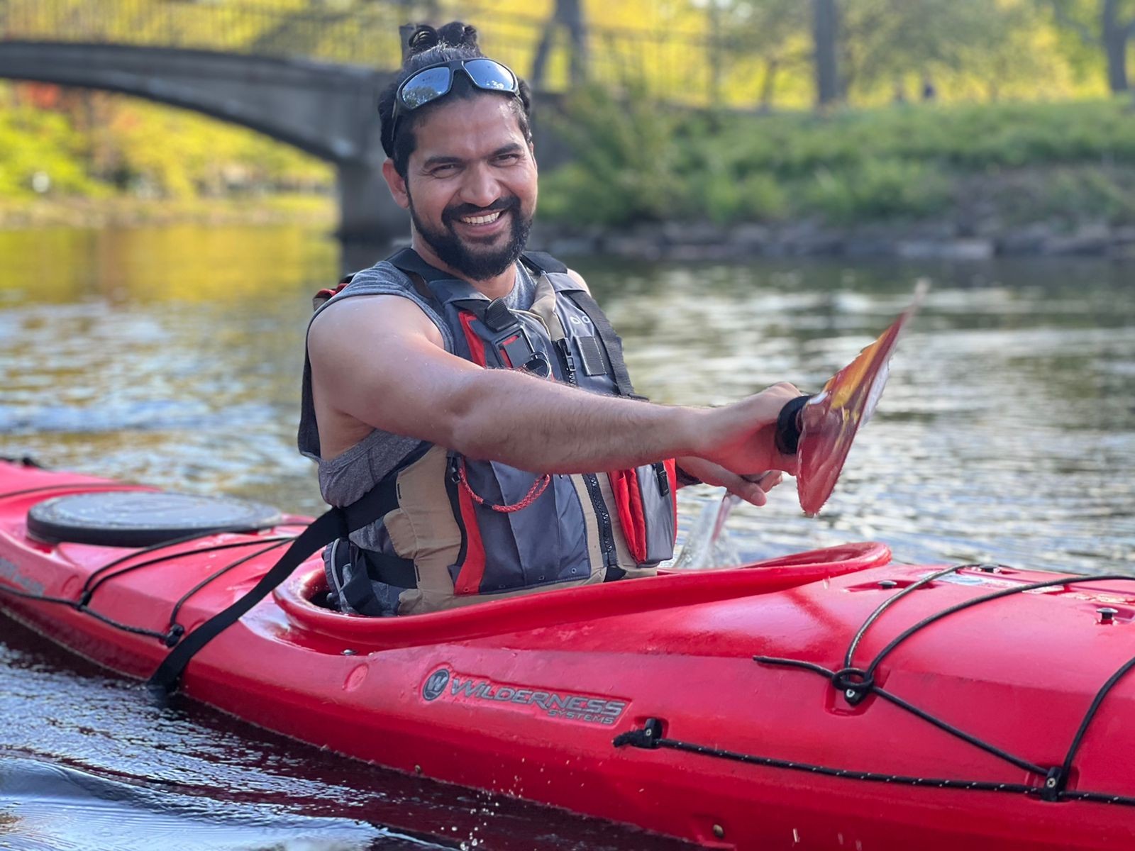 Saurabh Mhatre kayaks on the Charles River.