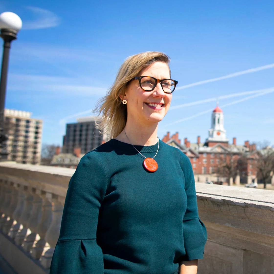 Professor Holly Samuelson stands on Weeks Bridge.