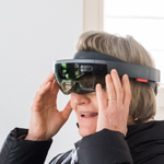 Guests trying on VR goggles at Harvard HouseZero Commissioning Ceremony